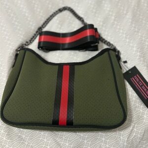Haute Shore Olive Neoprene Handbag, can be worn as a shoulder bag or crossbody.